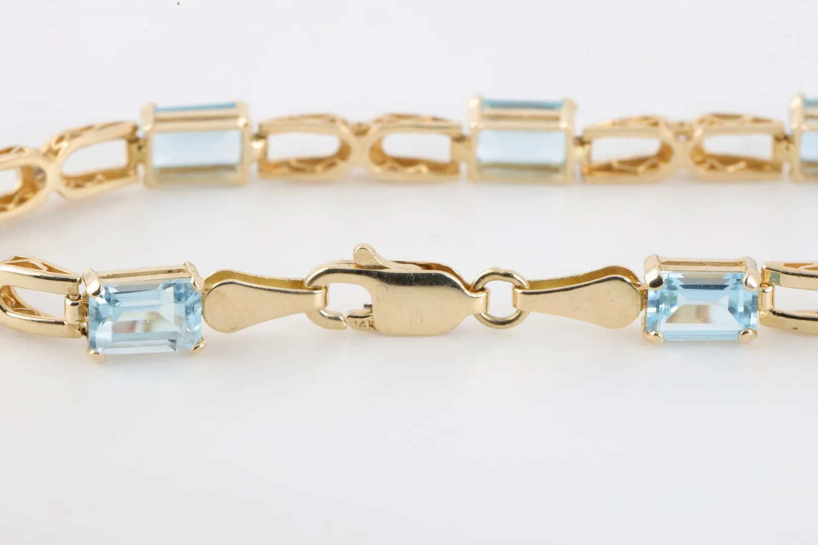 7" 14k Yellow Gold 4.50tcw Topaz 0.04tcw Diamond Bracelet (6.10g.)